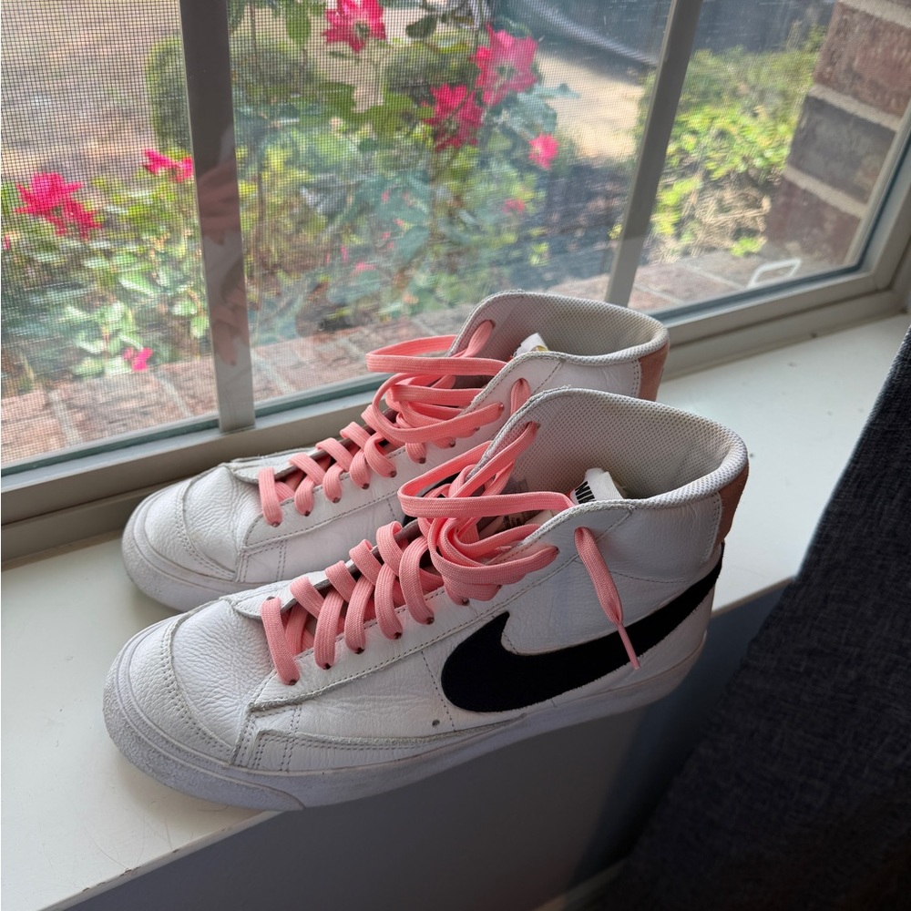 Nike White High-Top Sneakers with Pink Laces and Black Swoosh